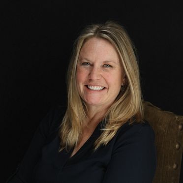 Headshot of Kim Haasarud.