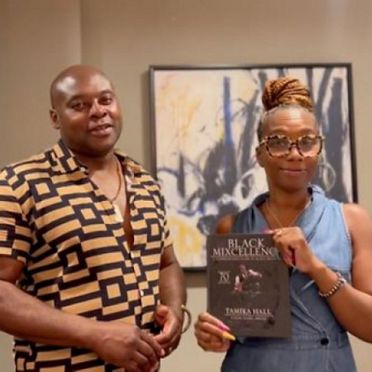 Headshot of Tamika Hall.